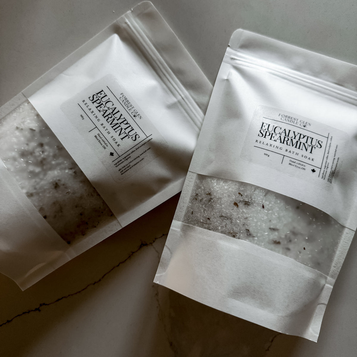 two packages of relaxing bath soaks, eucalyptus spearmint