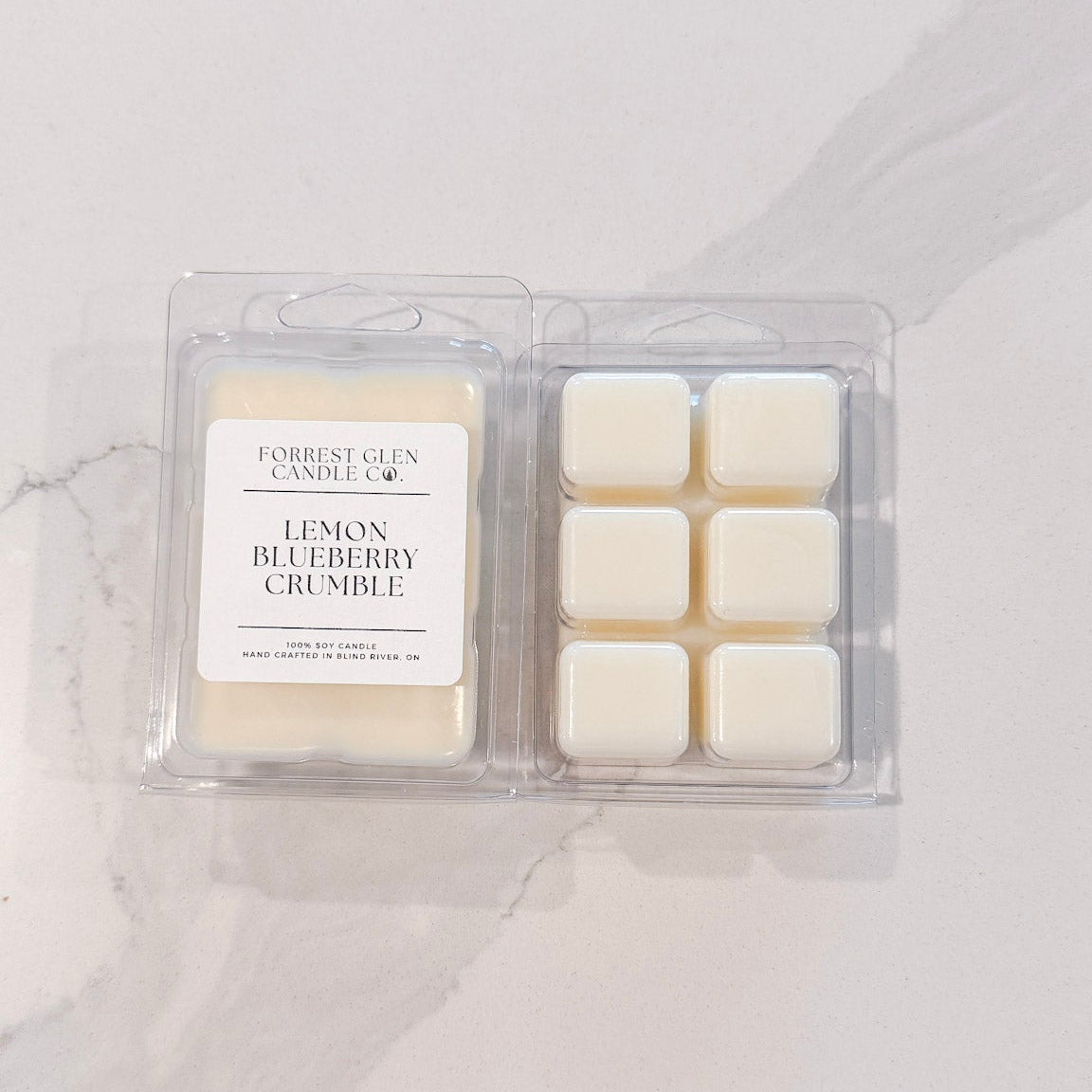 Pack of lemon blueberry crumble wax melts on a light gray background