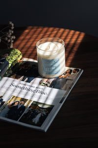 something blue candle on a table with a wedding magazine that says "something blue"